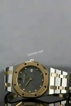 Load image into Gallery viewer, Two-tone stainless steel and gold watch with a diamond-studded dial.
