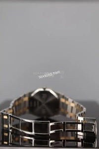 Two-tone metal watch with an octagonal case